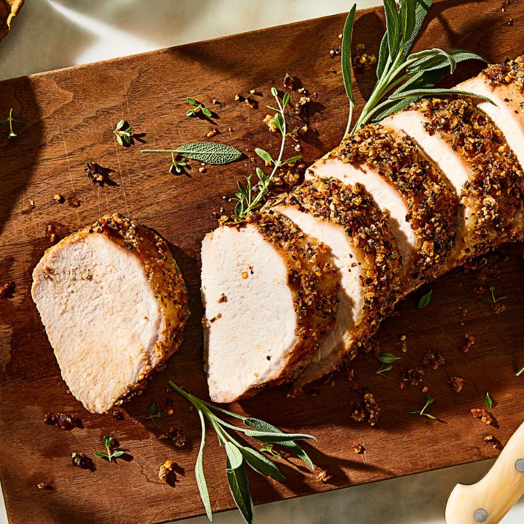 What temperature should pork loin roast be cooked at?