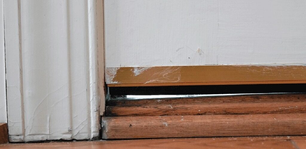 How do you fix rotted wood at the bottom of a door frame