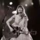 What are the main themes of Taylor Swift's songs?
