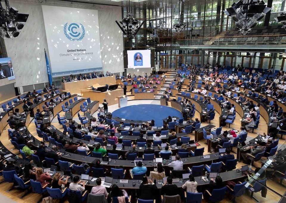 UN and EU officials discussing opposition to solar geoengineering at a global climate meeting