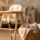 Cozy baby feeding setup with chair and storage basket